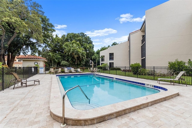 view of pool with a patio area