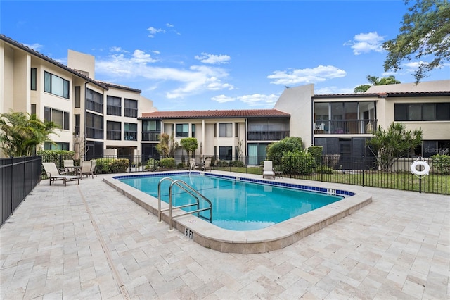 view of swimming pool featuring a patio