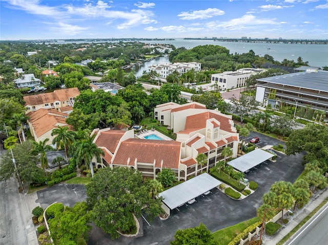 birds eye view of property featuring a water view