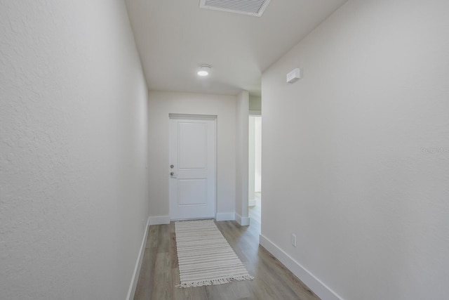 hall featuring light hardwood / wood-style flooring