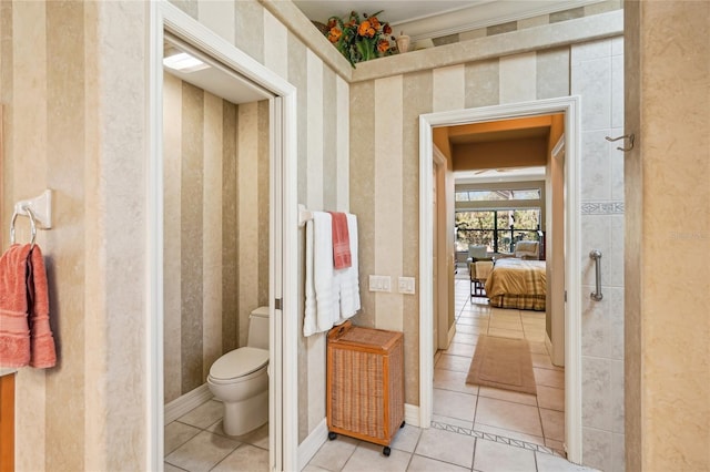 bathroom featuring tile patterned floors and toilet