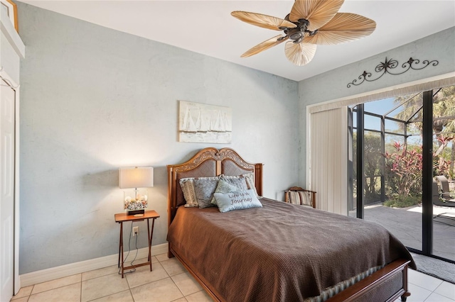 bedroom with ceiling fan, light tile patterned floors, and access to outside