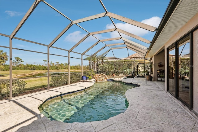 view of pool featuring a patio and a lanai