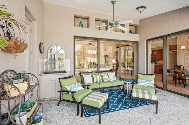 view of patio featuring outdoor lounge area and ceiling fan