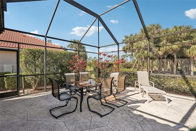 view of patio / terrace with glass enclosure