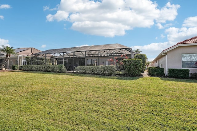 view of yard featuring glass enclosure