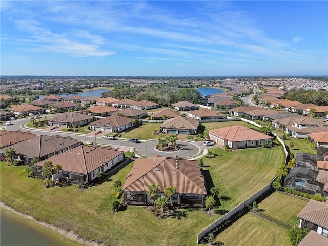 drone / aerial view featuring a water view