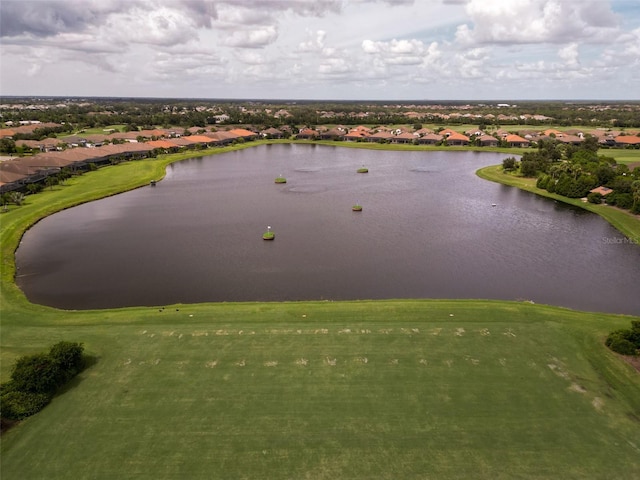birds eye view of property with a residential view, view of golf course, and a water view
