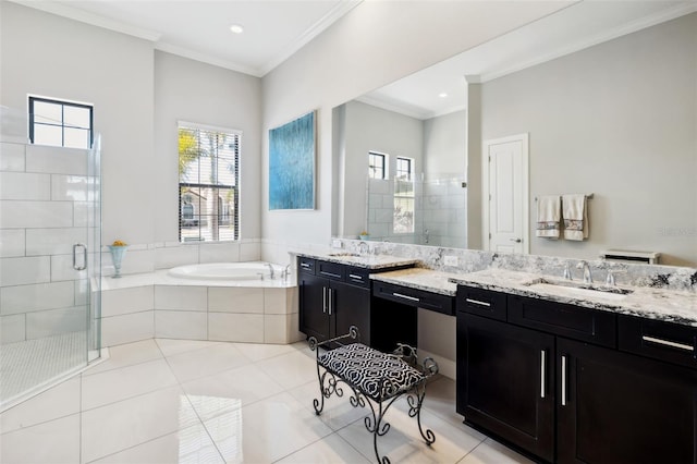 full bathroom featuring crown molding, a shower stall, a bath, vanity, and tile patterned floors