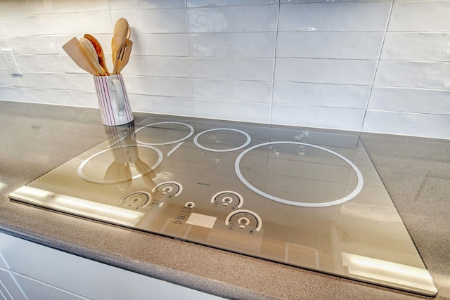 interior details featuring black electric cooktop