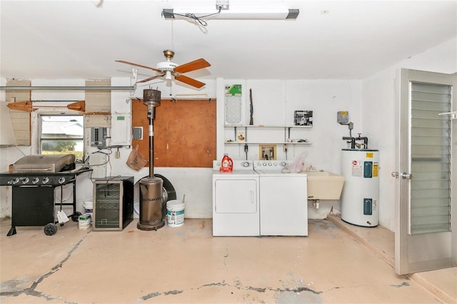 clothes washing area with ceiling fan, independent washer and dryer, sink, and electric water heater