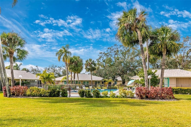 view of yard featuring a community pool