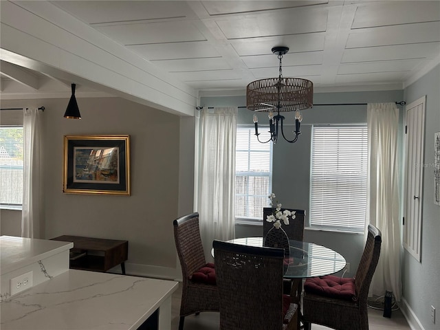 dining area with a notable chandelier