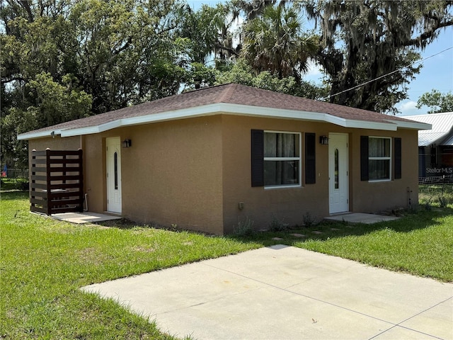 910 N Lee Ave, Arcadia, FL 34266 - single story home featuring stucco siding and a shingled roof