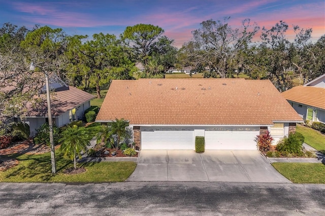 view of front of property with a garage