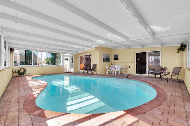 pool featuring a patio area