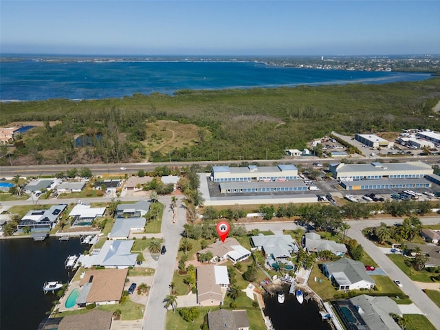 aerial view with a residential view and a water view