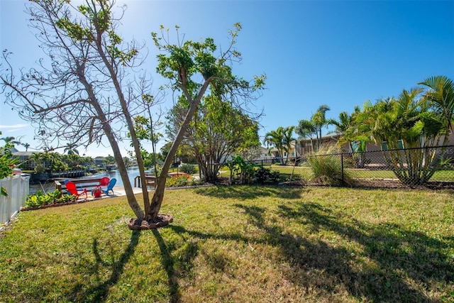 view of yard with a water view