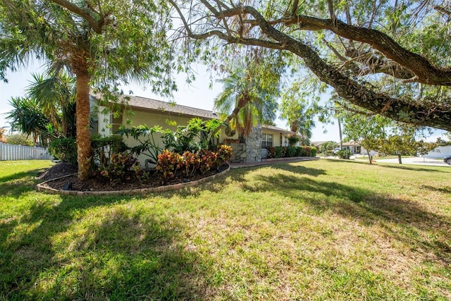 view of yard with fence