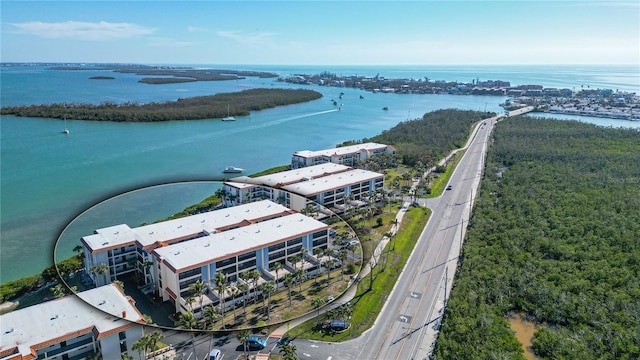 drone / aerial view featuring a water view