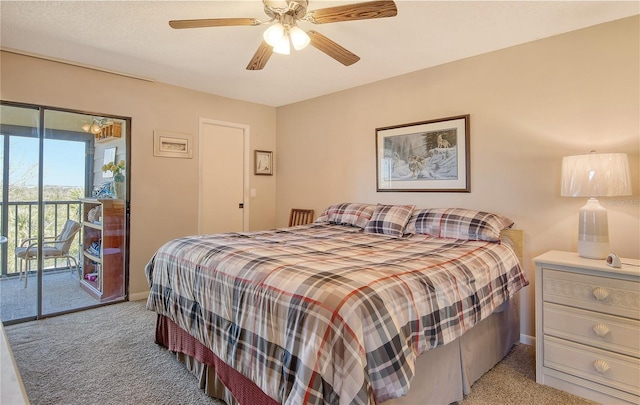 carpeted bedroom featuring access to exterior and ceiling fan