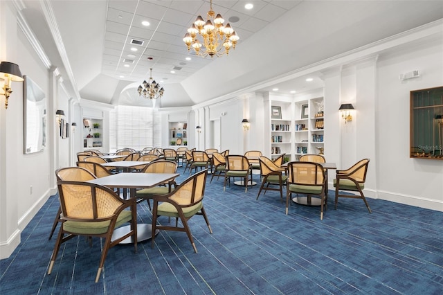 carpeted dining room with an inviting chandelier, crown molding, and built in features