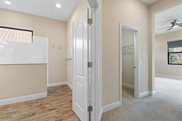 hall with light wood-type flooring