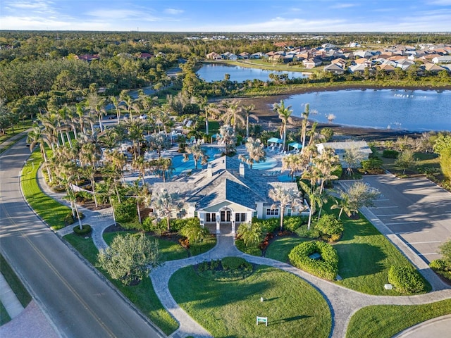 drone / aerial view with a water view