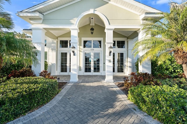 entrance to property featuring french doors