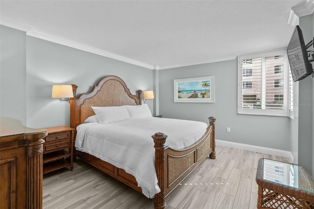 bedroom with ornamental molding and light wood-type flooring