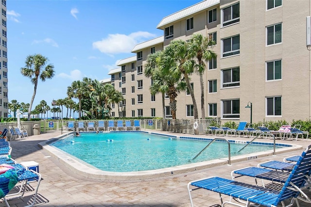 view of pool featuring a patio area