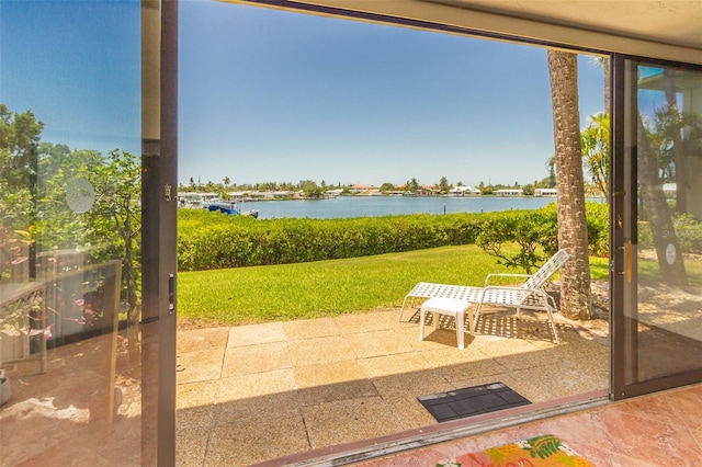 view of patio / terrace featuring a water view