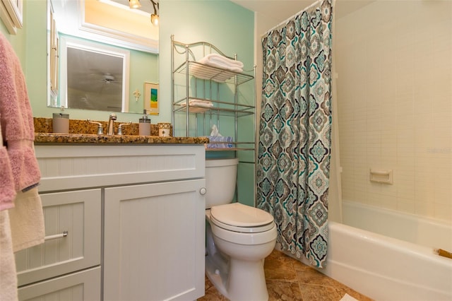 full bathroom featuring toilet, vanity, and shower / bathtub combination with curtain