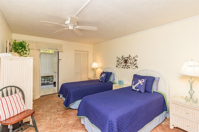 bedroom with ceiling fan and a closet