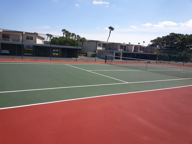 view of tennis court with basketball court