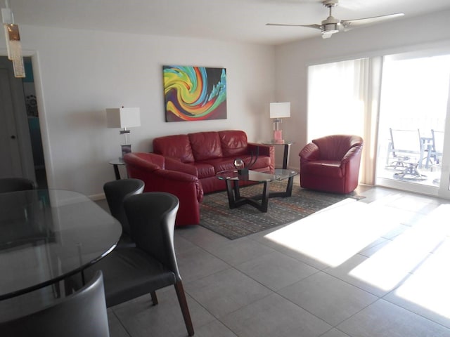 living room with tile patterned floors and ceiling fan