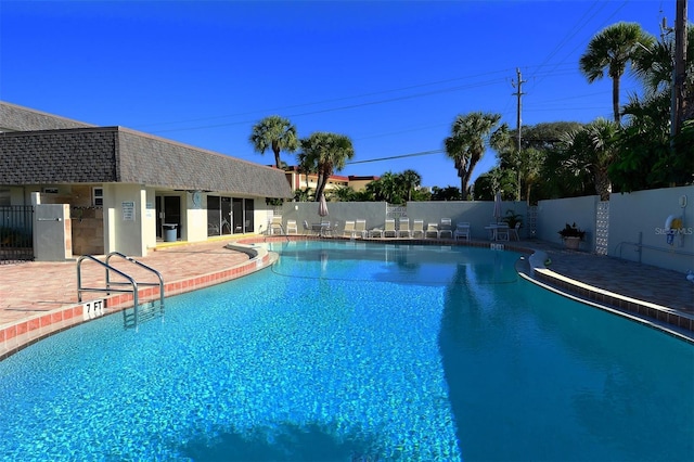 view of swimming pool featuring a patio