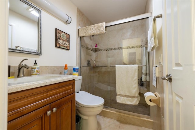 bathroom with vanity, an enclosed shower, tile patterned flooring, and toilet