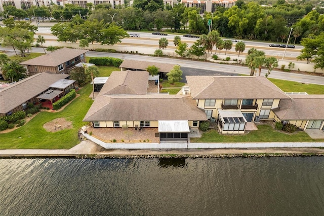 drone / aerial view featuring a water view