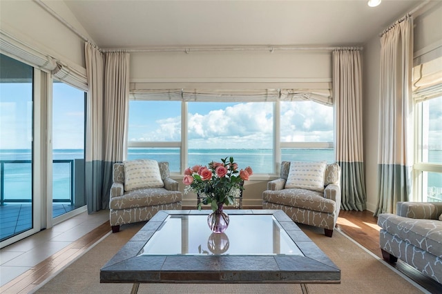 sunroom with a water view