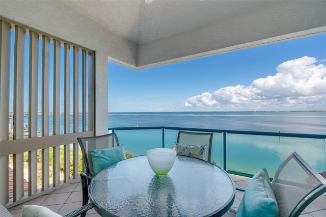 balcony featuring a water view