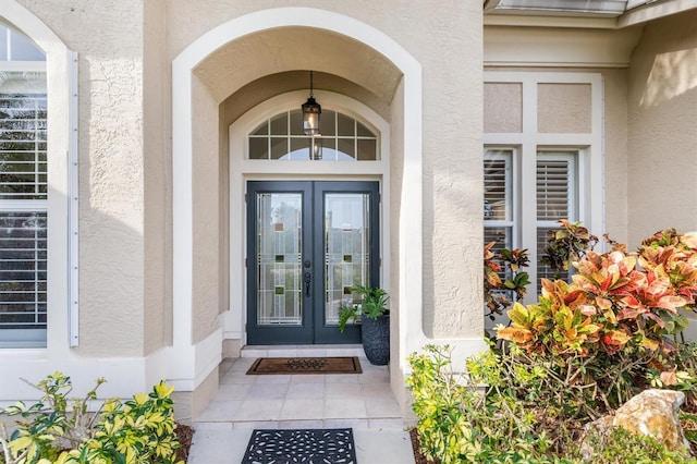 entrance to property featuring french doors