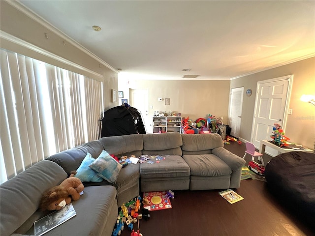 living room featuring hardwood / wood-style floors and ornamental molding