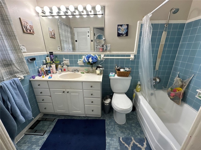 full bathroom with tile walls, vanity, shower / bath combination with curtain, and toilet