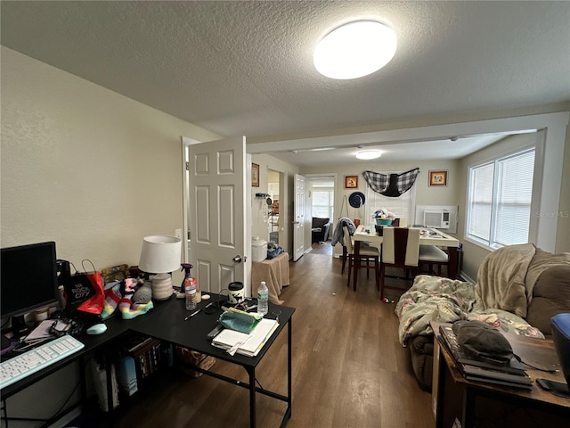 office featuring hardwood / wood-style floors and a textured ceiling