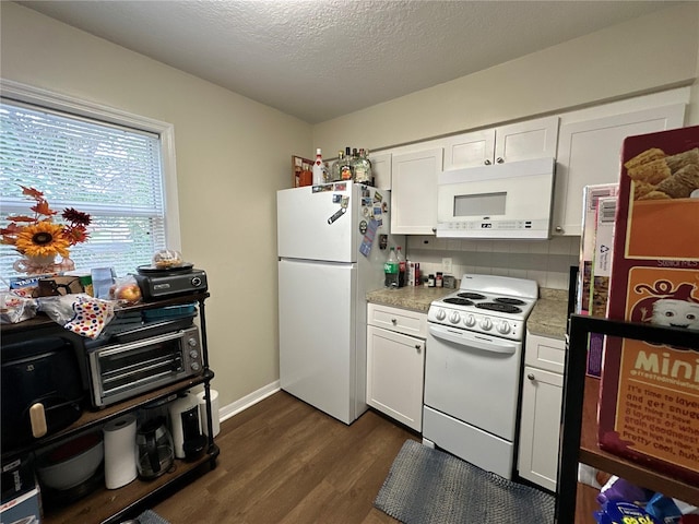 kitchen featuring white cabinetry, dark hardwood / wood-style floors, a textured ceiling, and white appliances