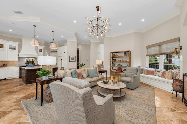 living room featuring ornamental molding and a notable chandelier