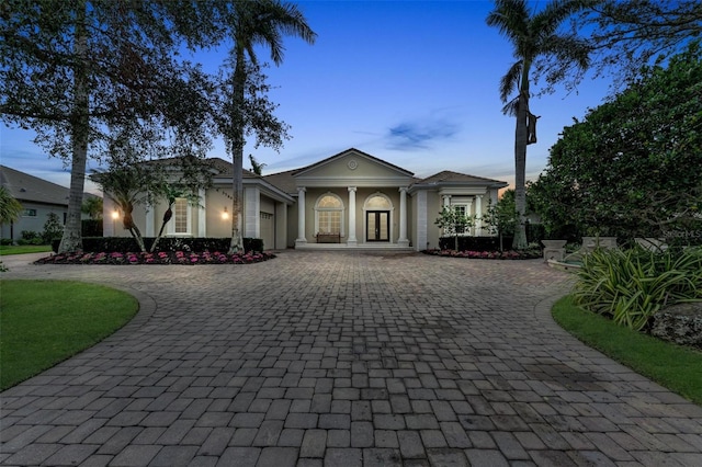 view of front of property featuring a garage