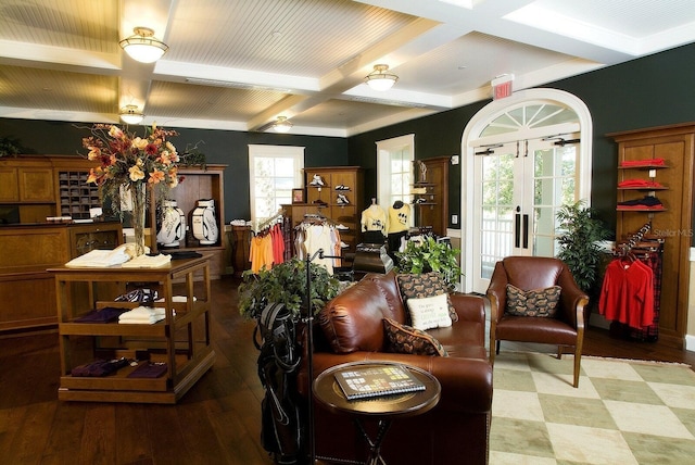 interior space with coffered ceiling, hardwood / wood-style floors, beam ceiling, and french doors