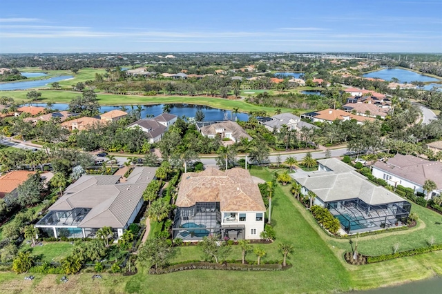 birds eye view of property featuring a residential view and a water view